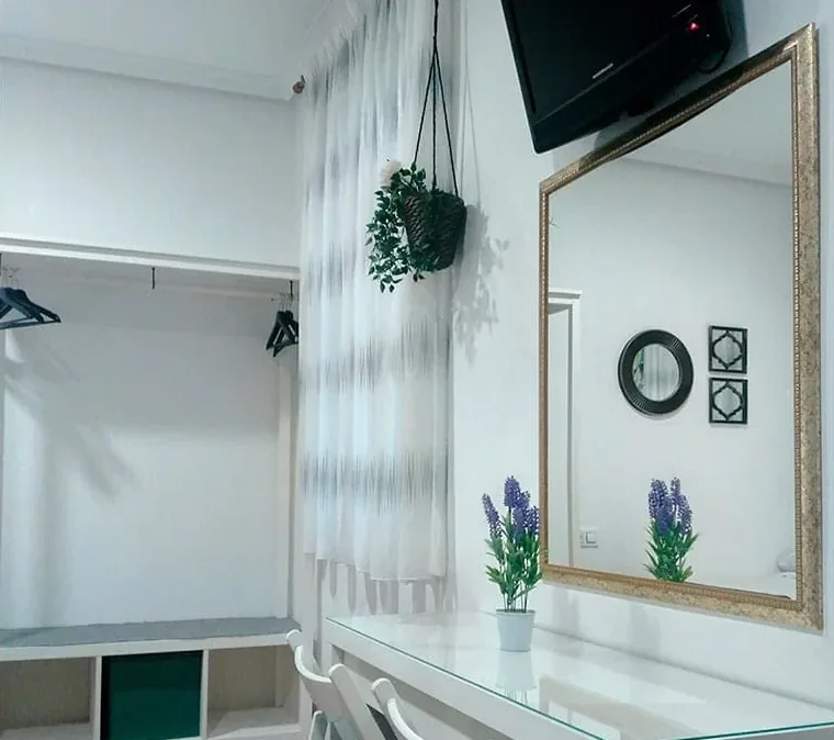 Habitación doble con cama extra para tres personas en el Hostal Bruña