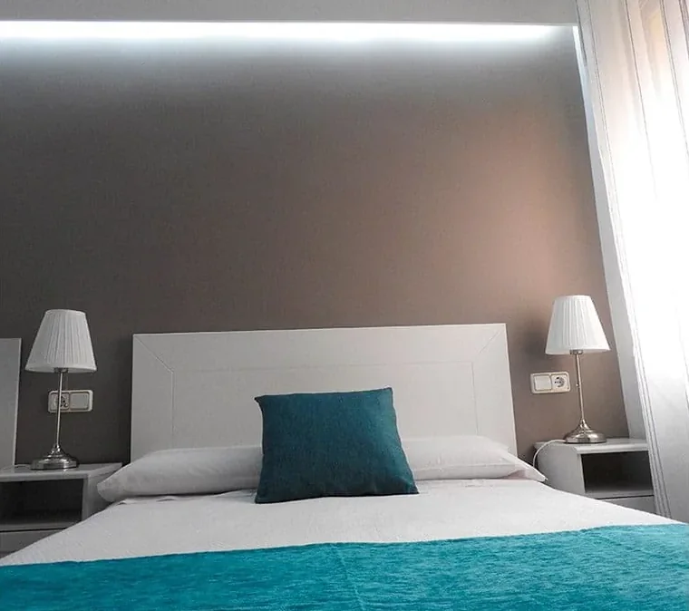 Habitación doble con cama extra para tres personas en el Hostal Bruña